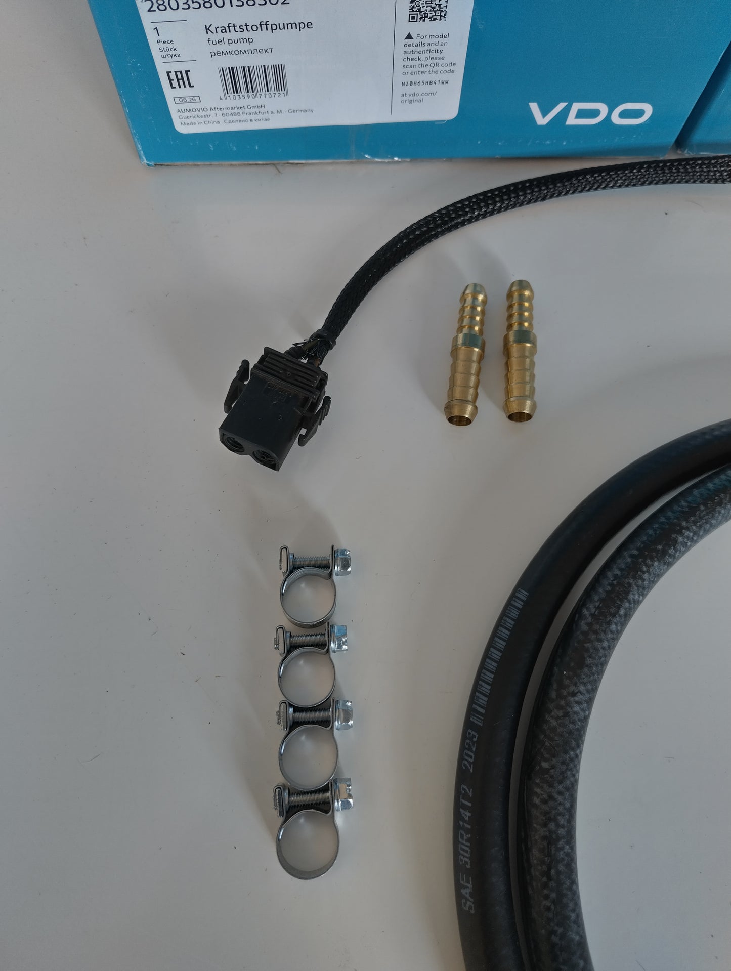 Wiring connector, brass step-up adaptors and EFI hose clamps from the BMW E36 twin fuel pump kit