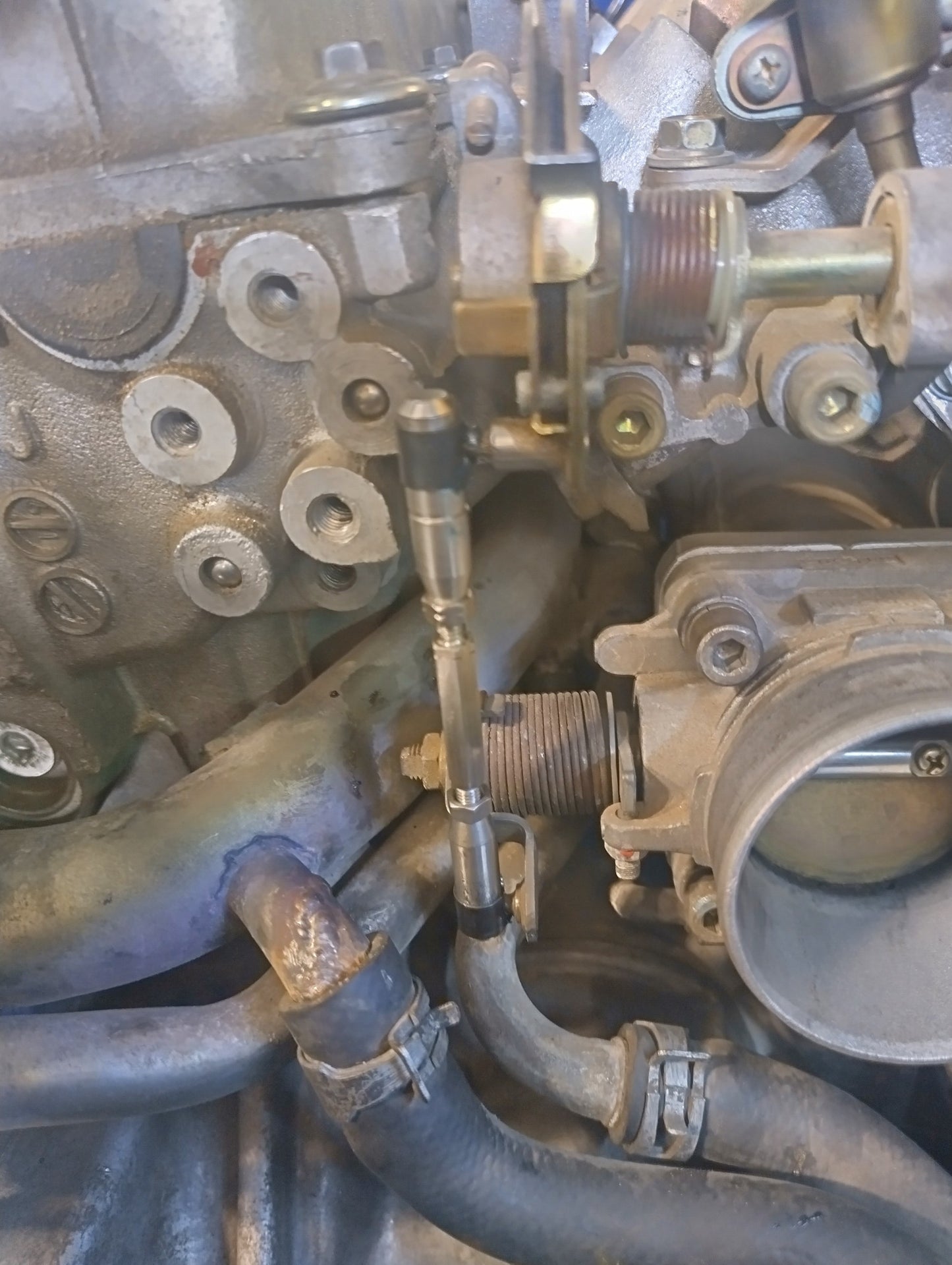 OEM replacement throttle arm in steel for SR20DE engine