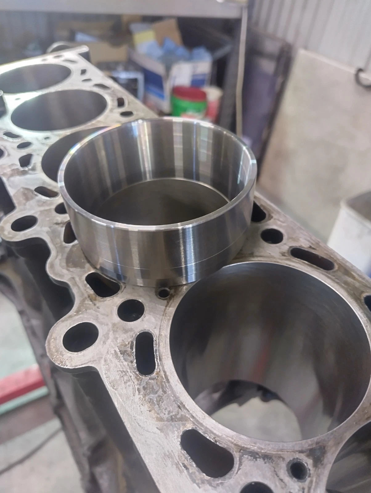 Tapered ring compressor sleeve for engine rebuild and piston fitting