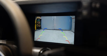 Haltech uC-10 dash display showing reverse camera feed with guide lines