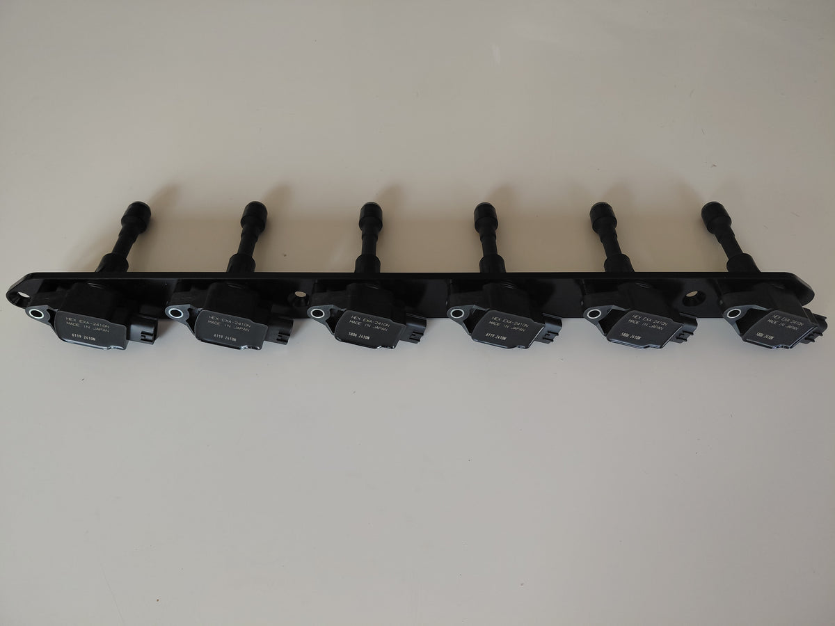 Anodised billet coil bracket with six R35 GTR ignition coils fitted, for Nissan RB engines