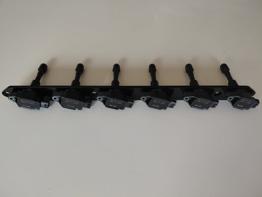 Anodised billet coil bracket with six R35 GTR ignition coils fitted, for Nissan RB engines
