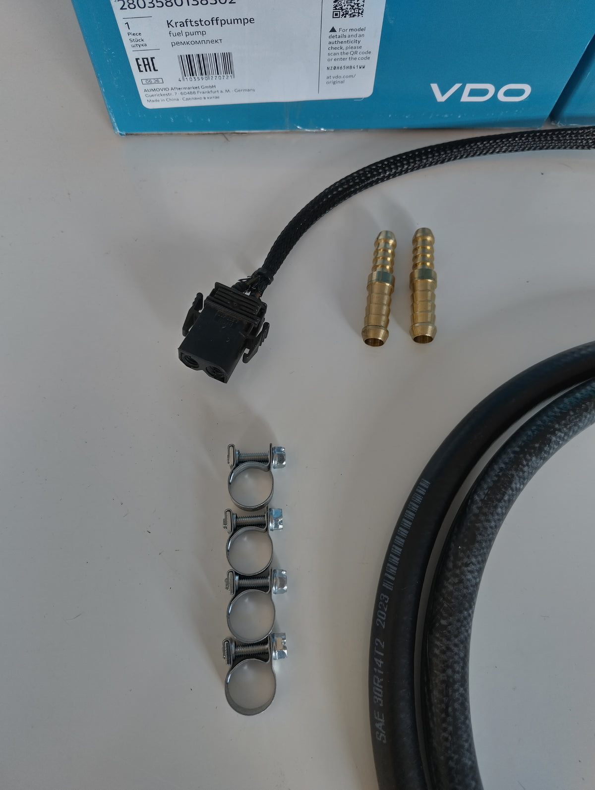 Wiring connector, brass step-up adaptors and EFI hose clamps from the BMW E36 twin fuel pump kit