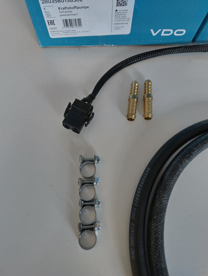 Wiring connector, brass step-up adaptors and EFI hose clamps from the BMW E36 twin fuel pump kit